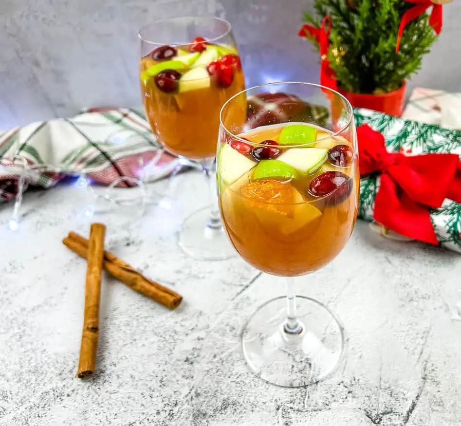 Christmas sangria with cranberries and cinnamon.