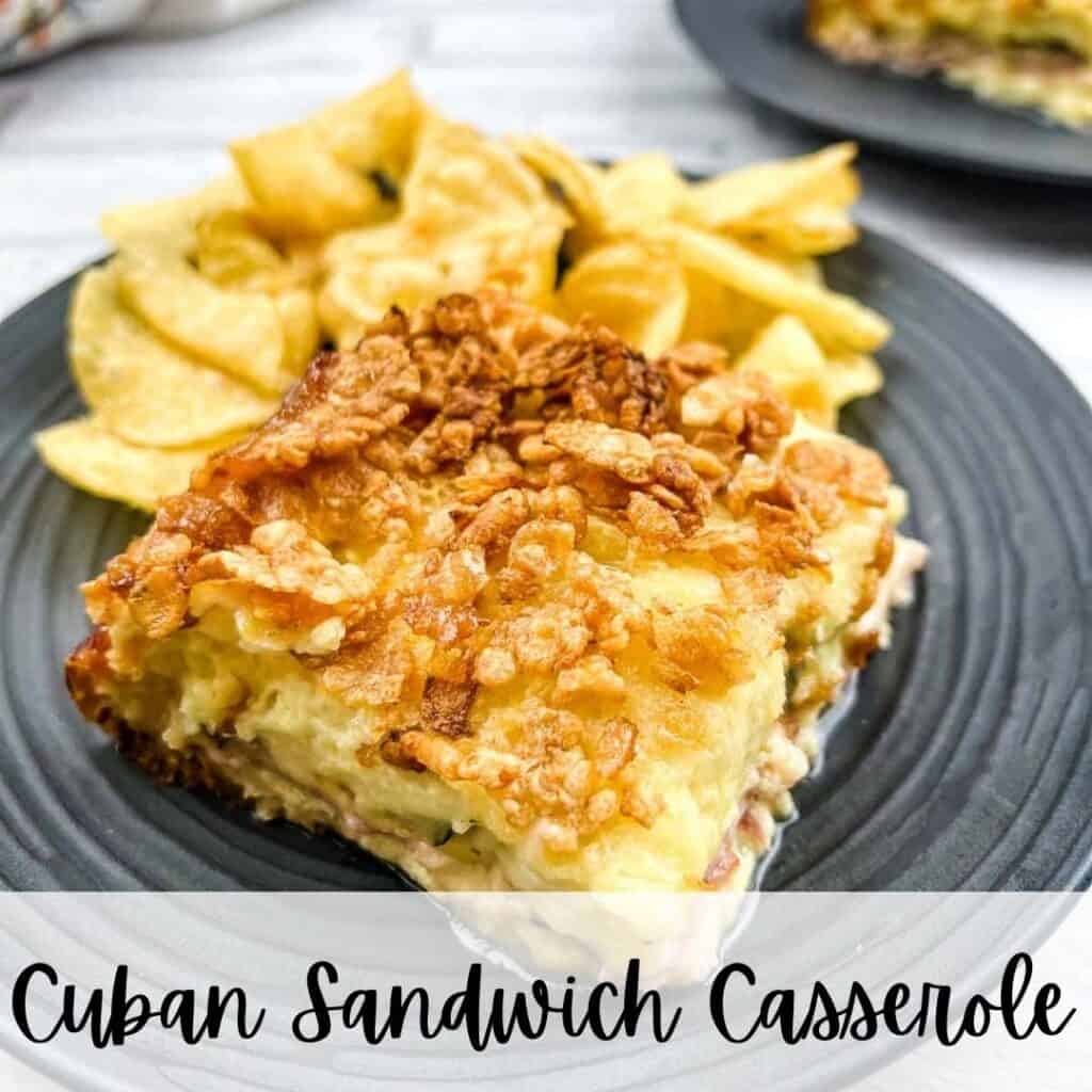 Cuban sandwich casserole on a plate with chips.
