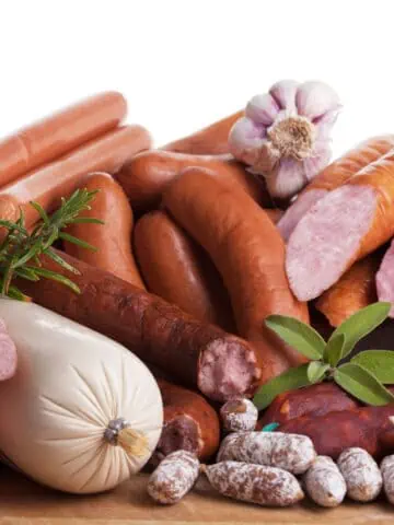 Sausages on a wooden table.