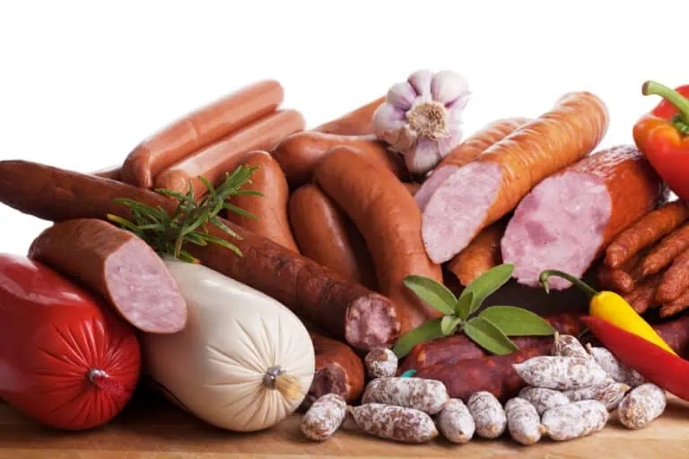 Sausages on a wooden table.