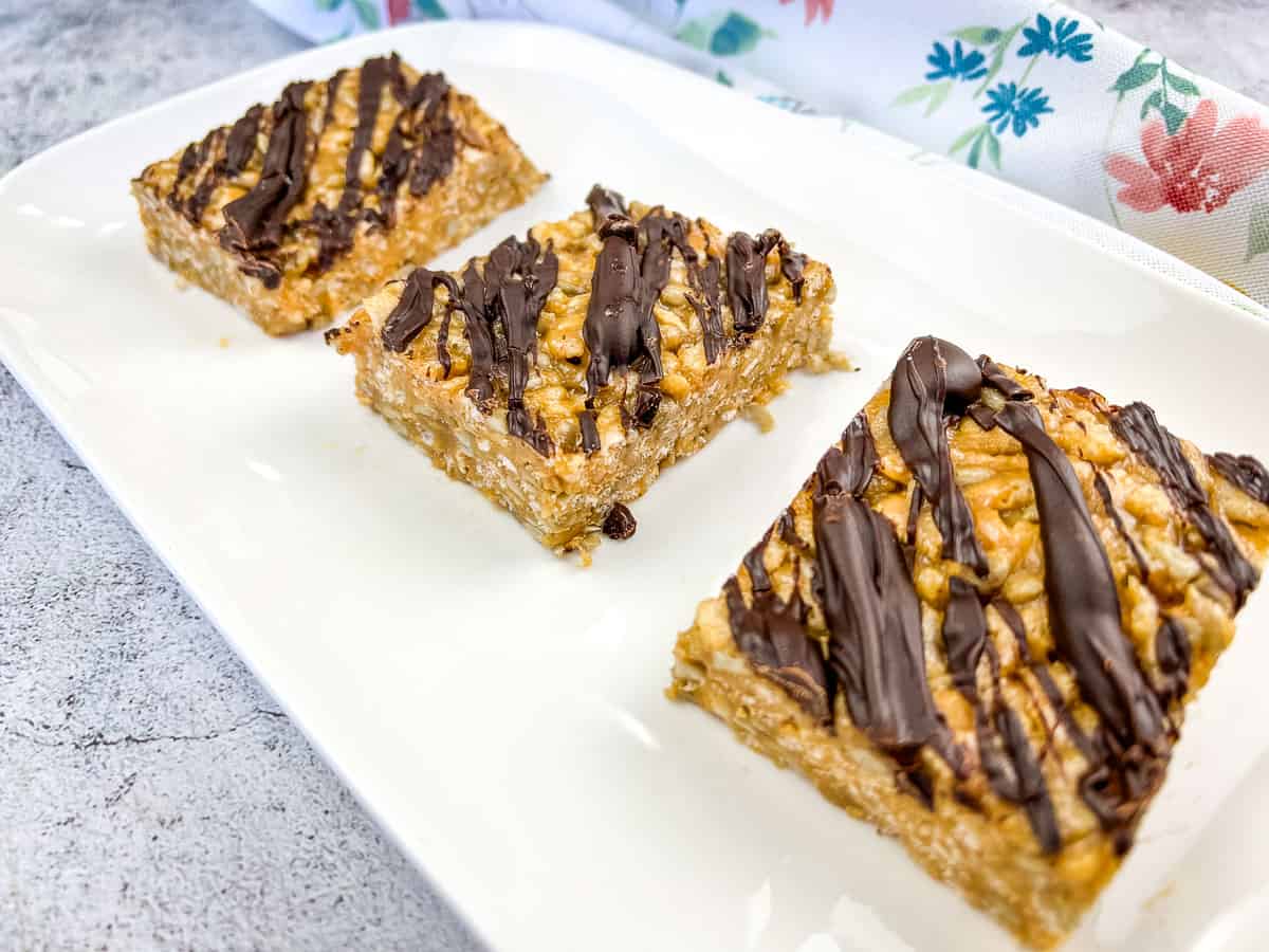 Four pieces of molly bars on a white plate.