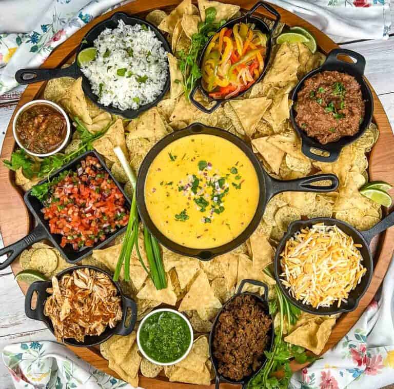 A large platter of mexican food on a table.