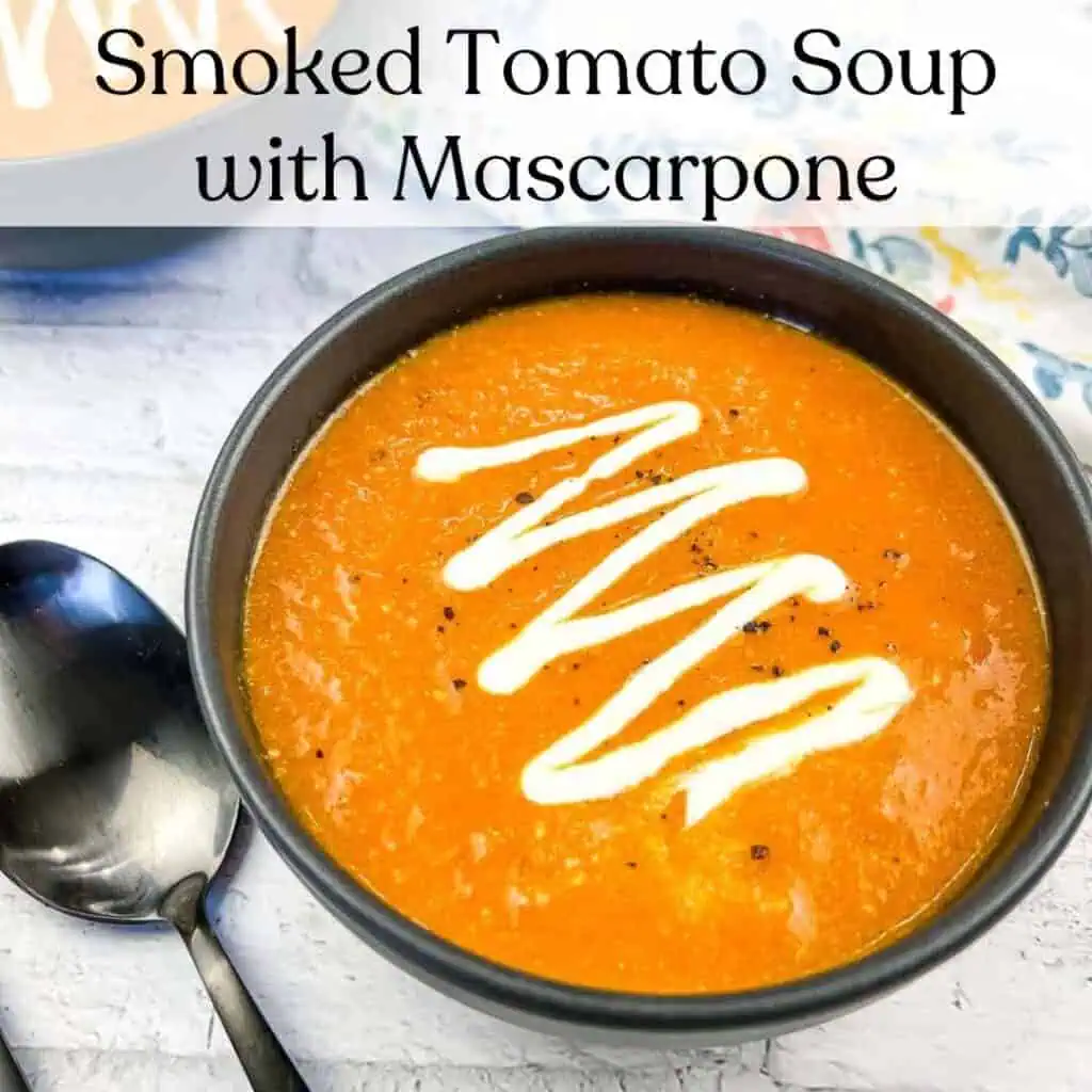 Smoked tomato soup with mascarpone in a bowl.
