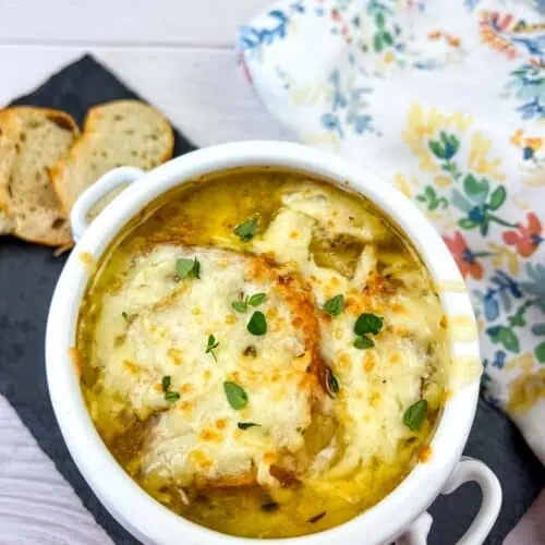 French onion soup in a white bowl.