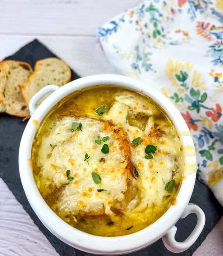 French onion soup in a white bowl.