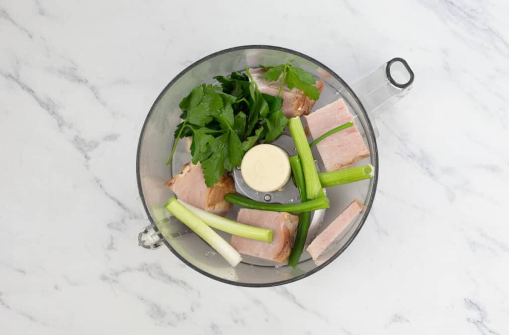 Ingredients for Southern Ham Salad in a food processor.