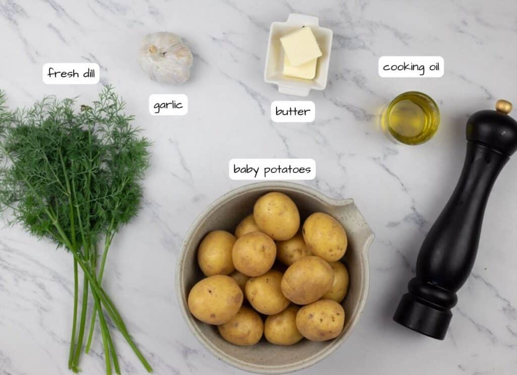 Ingredients for roasted potatoes with dill and garlic.