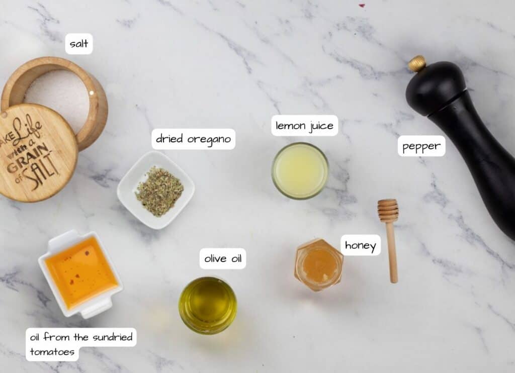 The ingredients for a Mediterranean orzo salad with shrimp.