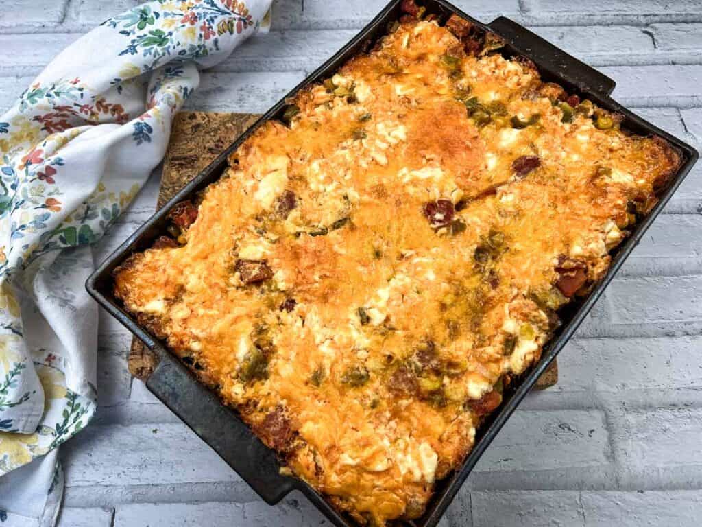 A casserole dish with cheese and meat in it.