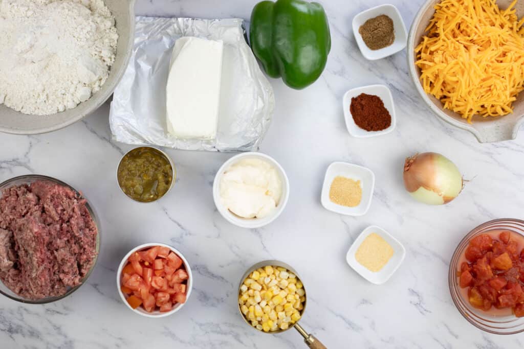 Ingredients for John Wayne Casserole on a marble table.