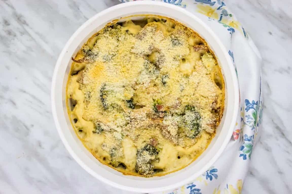 A casserole dish with broccoli and turkey.