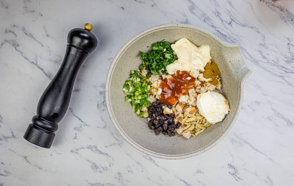 A bowl of food on a marble table.