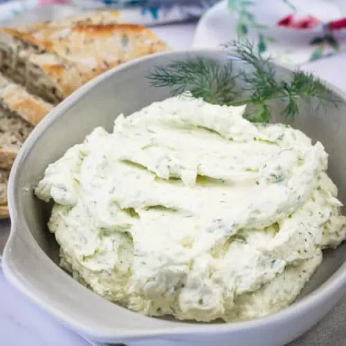 A bowl of homemade Boursin Cheese with Fresh Herbs.