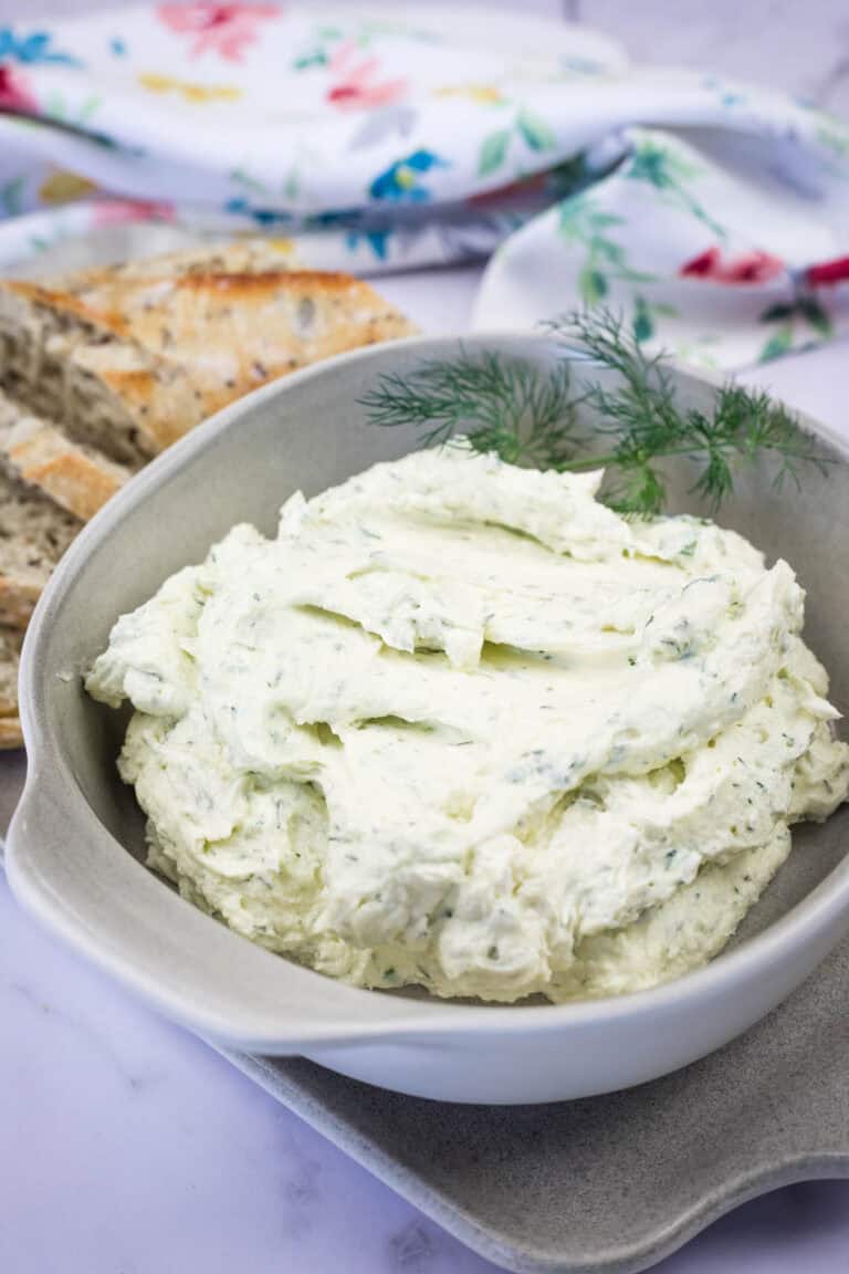A bowl of homemade Boursin Cheese with Fresh Herbs.