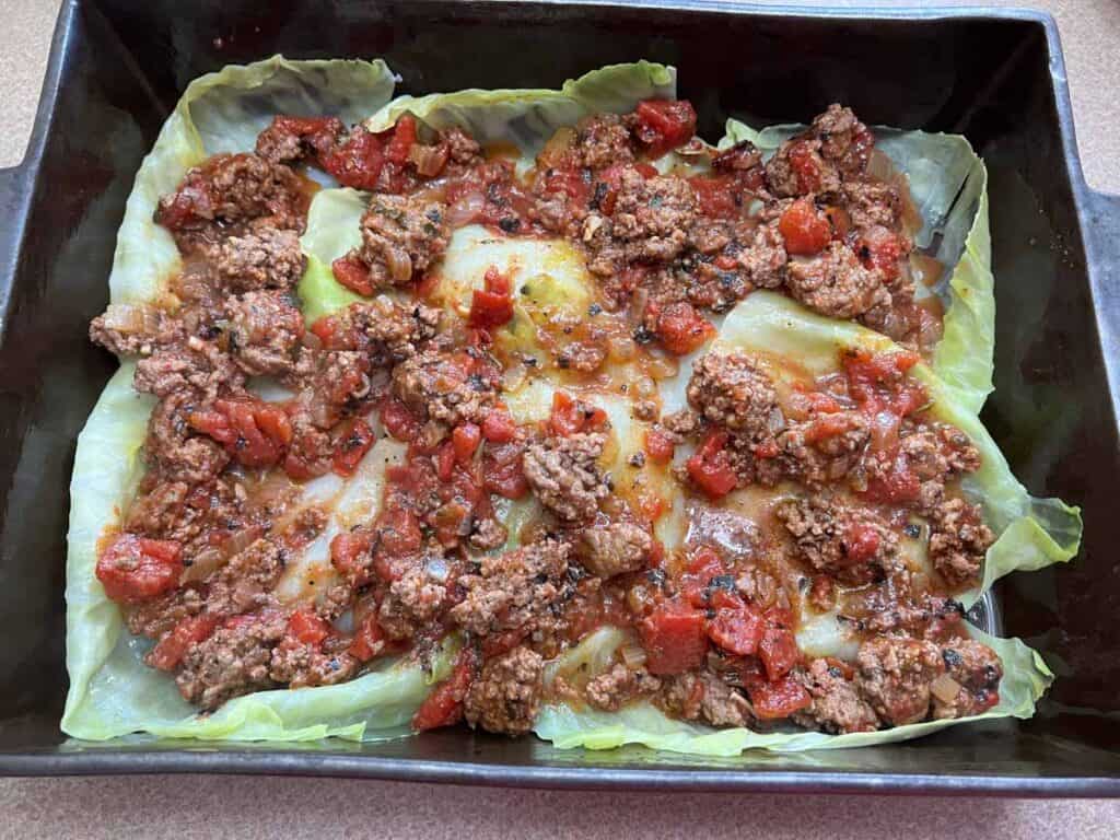 Add half of the sauce on top of the first layer.