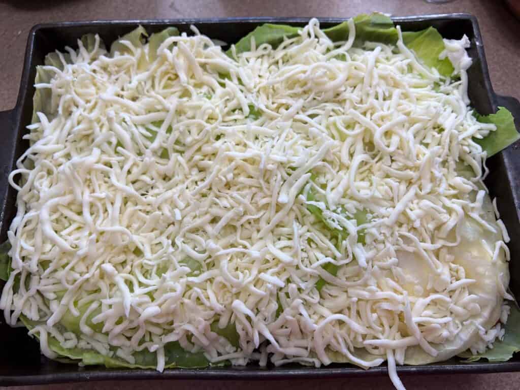 Top with shredded mozzarella.