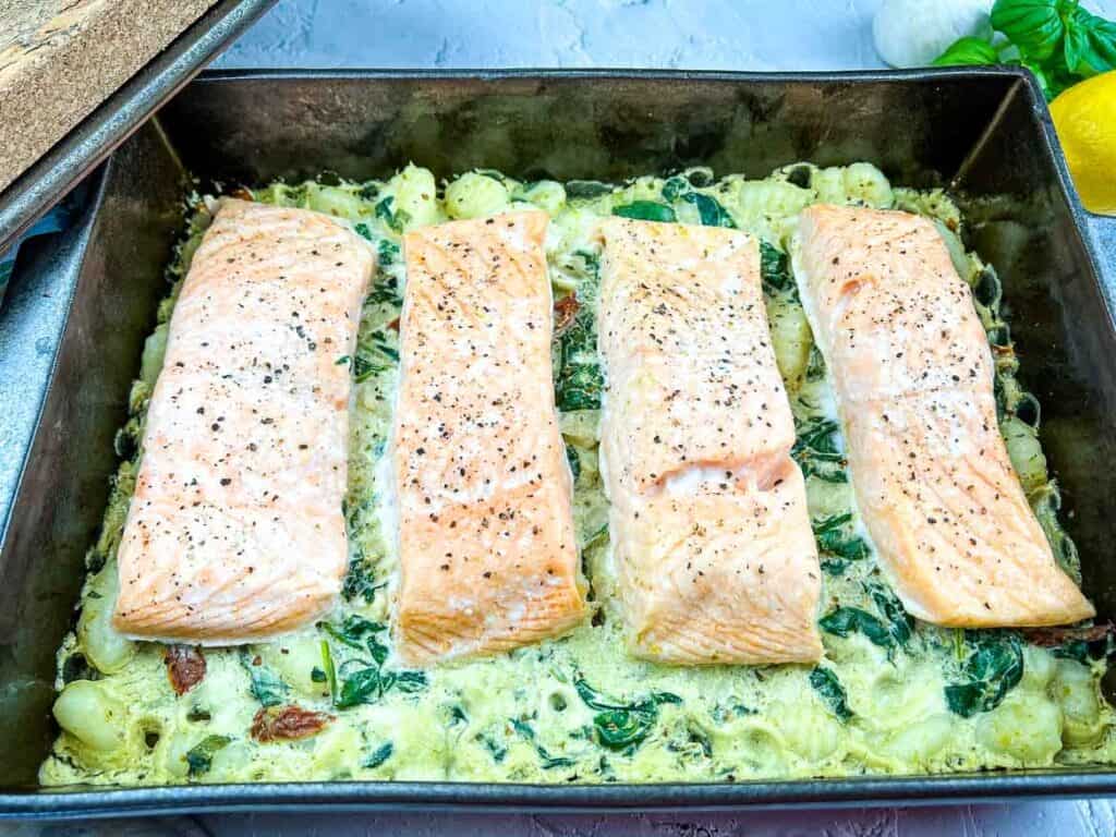 Salmon Gnocchi Bake with Gremolata on a casserole dish.