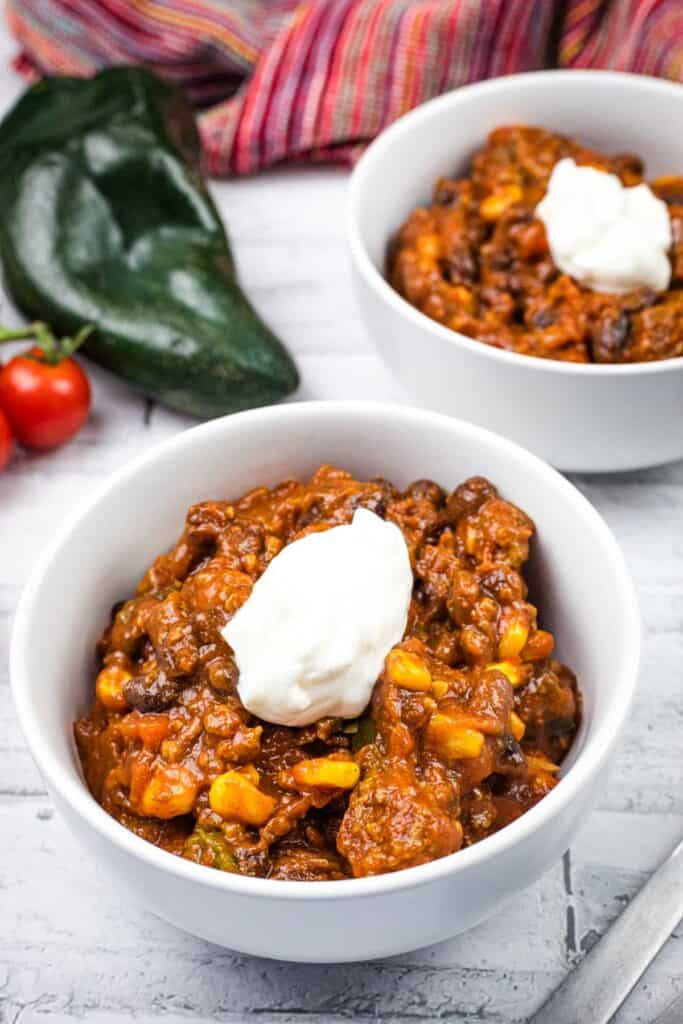 Two bowls of Slow Cooker Southwestern Chili.