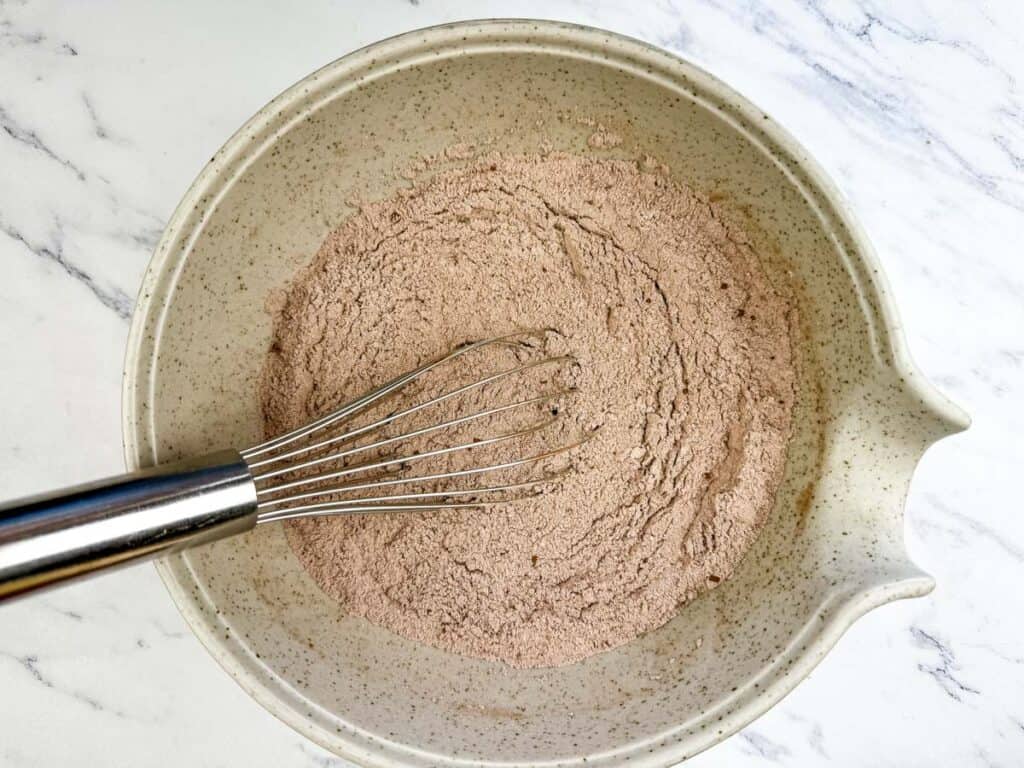 Mix the Coca-Cola soda, buttermilk, and vanilla extract.