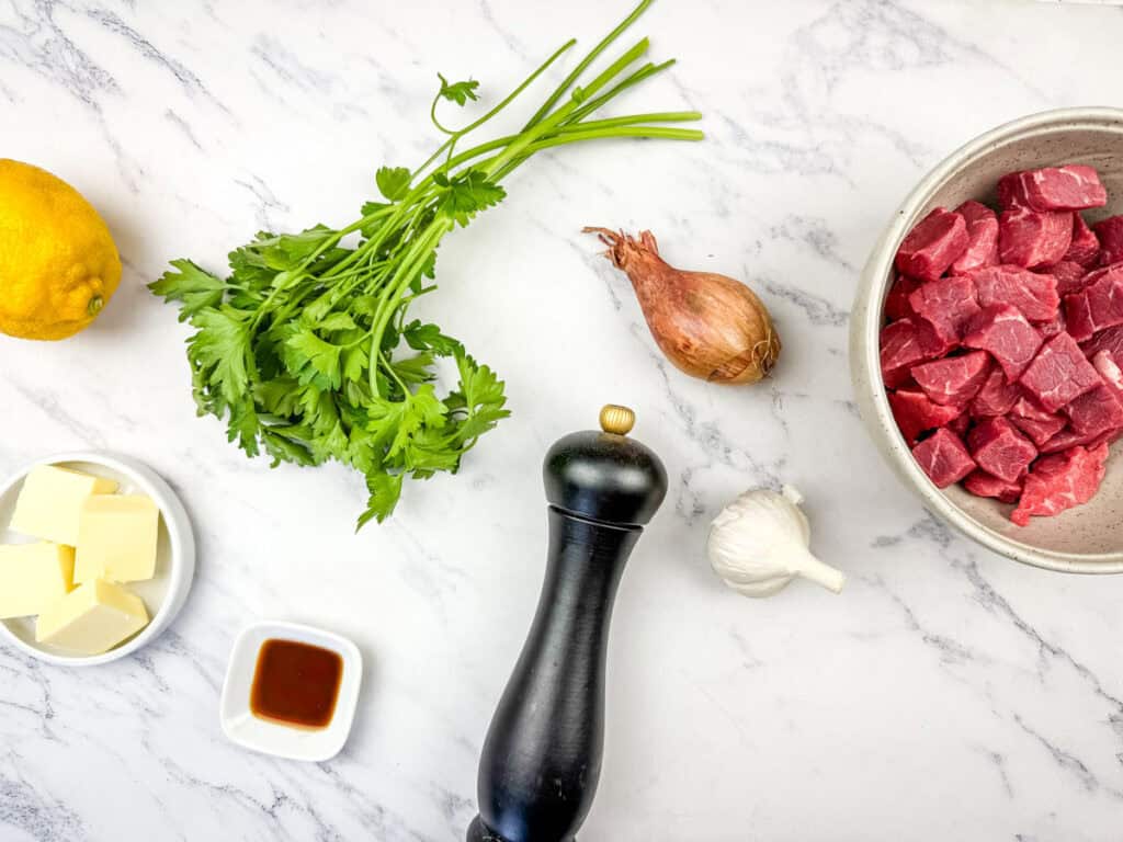 Garlic Butter Steak Bites Escargot-Style ingredients on a table.