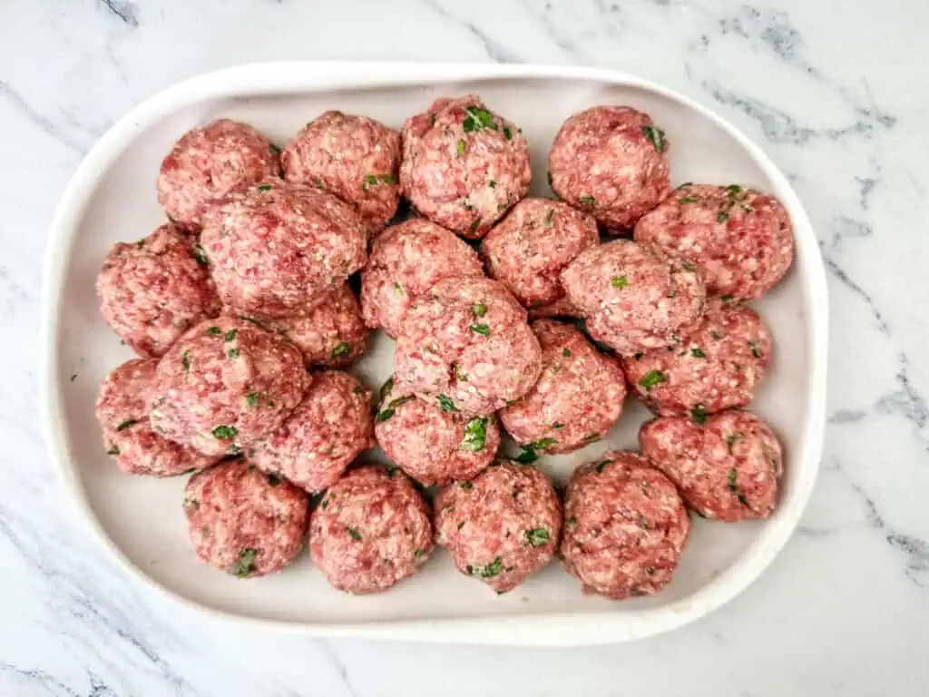 Formed mixture into evenly sized meatballs.
