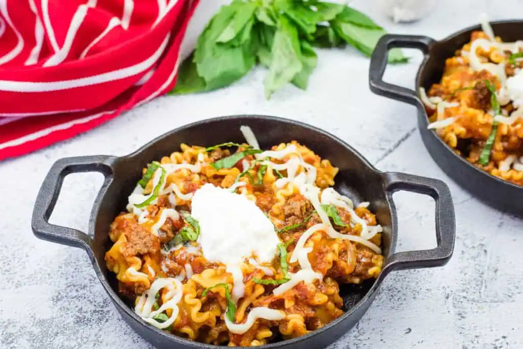 Skillet lasagna served in a black bowl