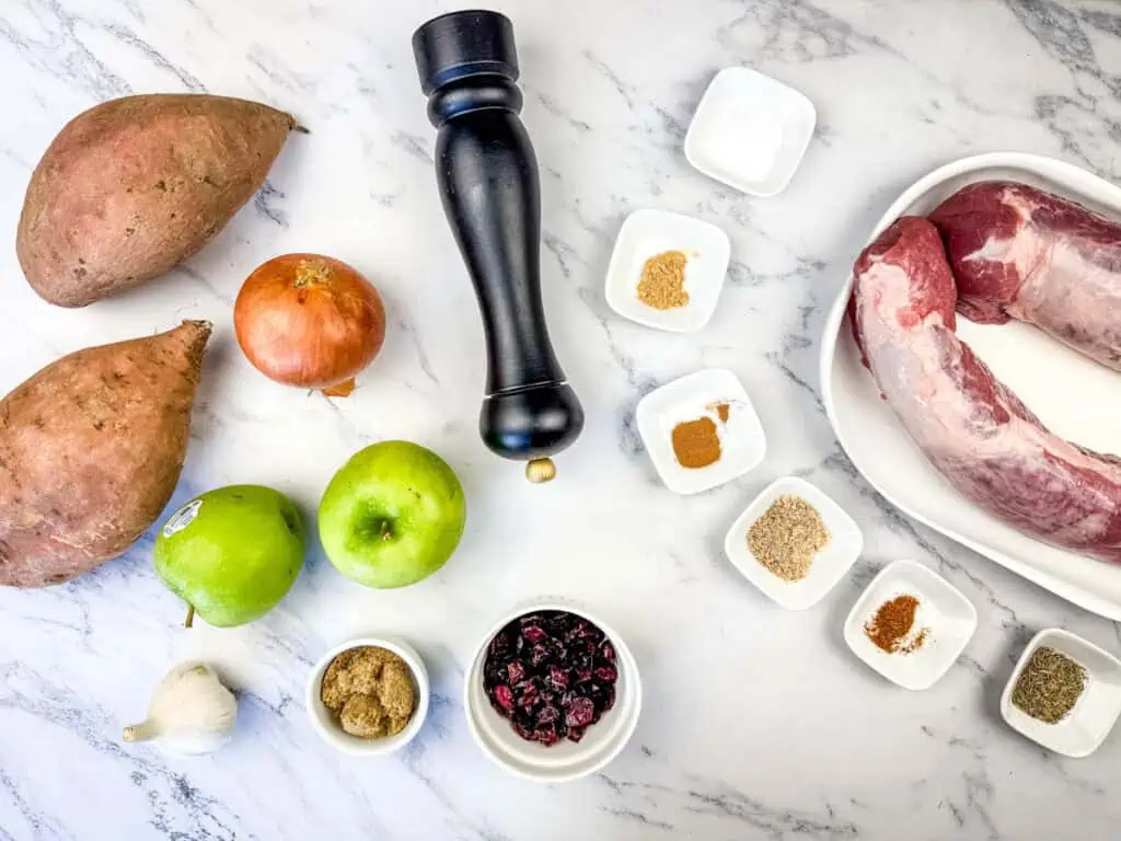 Slow Cooker Pork Tenderloin with Sweet Potatoes & Apples ingredients on the table.