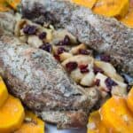A serving of Slow Cooker Pork Tenderloin with Sweet Potatoes & Apples.