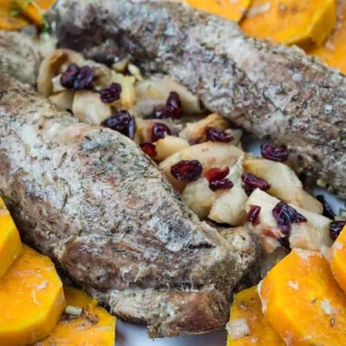 A serving of Slow Cooker Pork Tenderloin with Sweet Potatoes & Apples.