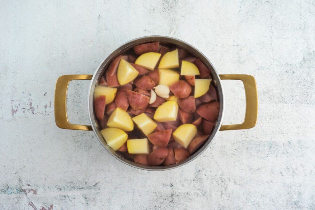 Boil the potatoes.