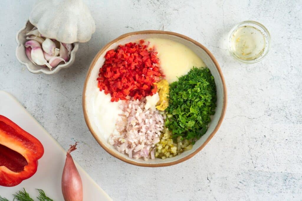 Prepare dressing ingredients in a bowl.