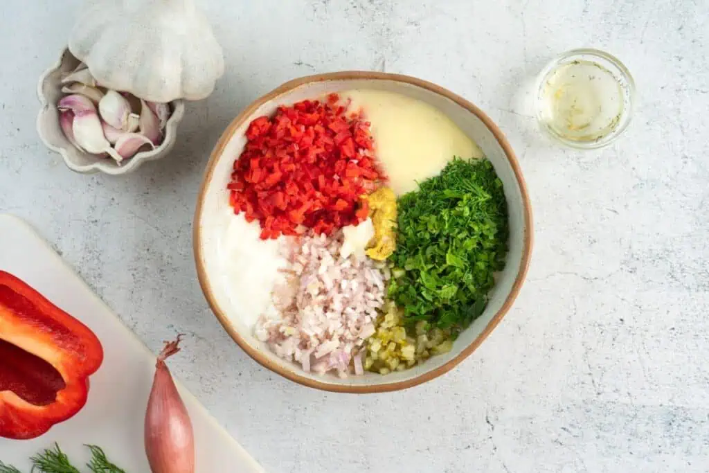 Preparing dressing for Creamy Red Potato Salad with Pickle. 
