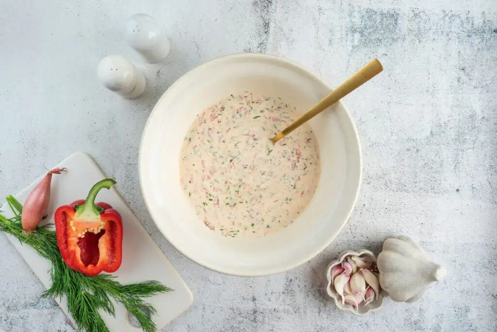 Mixing ingredients for dressing.