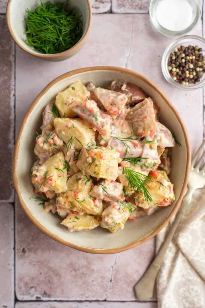 Photo of a delicious Creamy Red Potato Salad with Pickle.