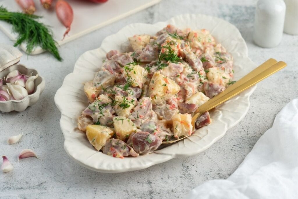 Photo of a delicious Creamy Red Potato Salad with Pickle. 
