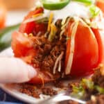 A plate of Taco Stuffed Tomatoes.