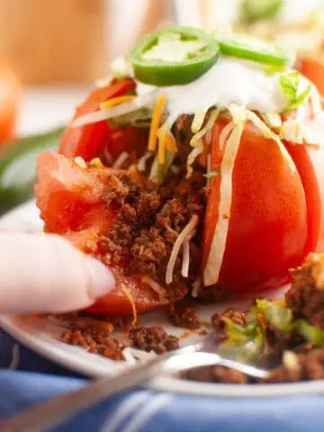 A plate of Taco Stuffed Tomatoes.