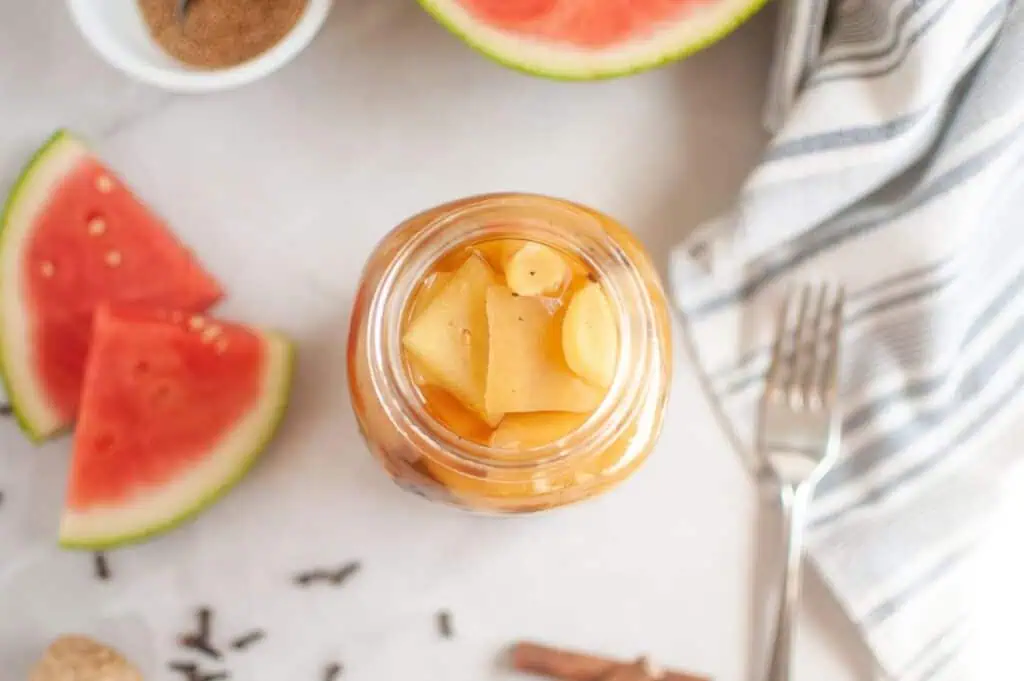 Watermelon and apple jam in a jar.