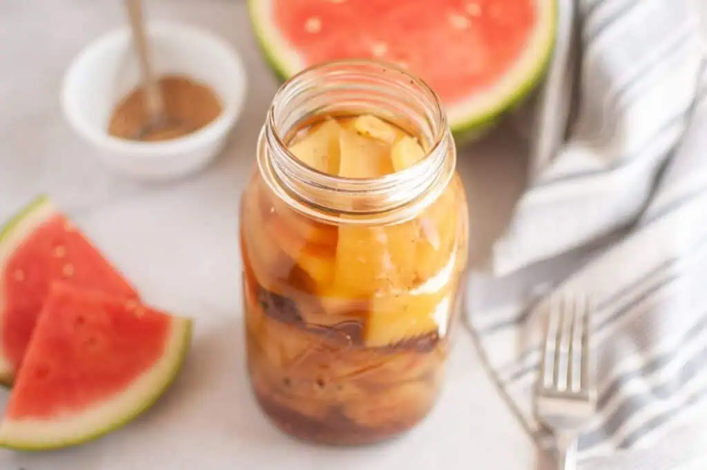 Watermelon and apple jam in a jar.