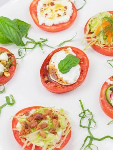 A plate of food on a white surface.