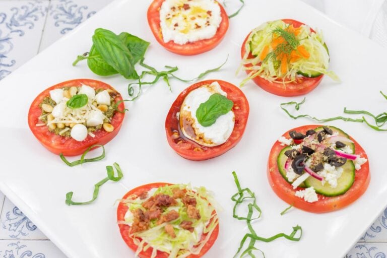 A plate of food on a white surface.