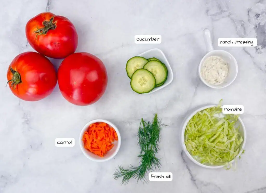 A group of tomatoes and cucumbers.
