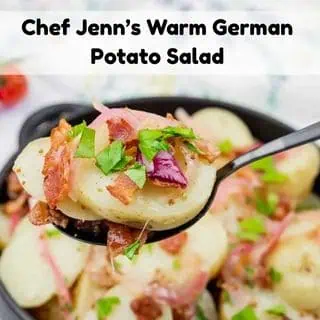 A square of Chef Jenn's Warm Potato Salad displaying a spoonful of warm German potato salad held above the same dish.