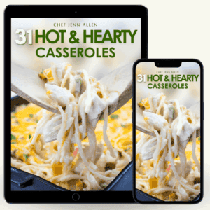 An iPad and an iPhone display the cover of a cookbook titled "31 Hot & Hearty Casseroles" by Chef Jenn Allen, featuring cheesy casserole being served with a spoon.