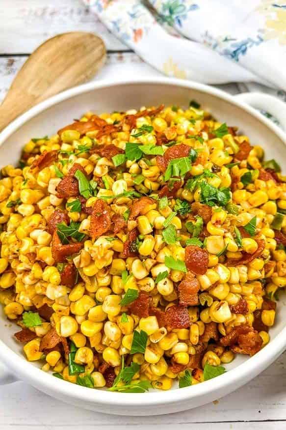 Bacon Fried Corn in a white serving bowl.