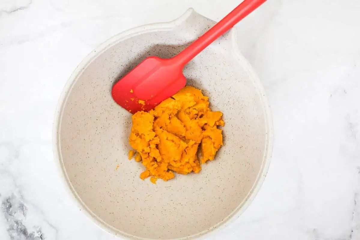 Mashed sweet potato in a bowl.
