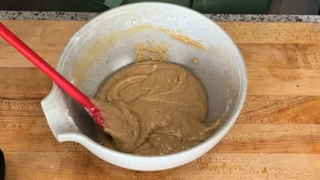 Pour the wet ingredients into the dry and fold gently with a spatula just until combined.