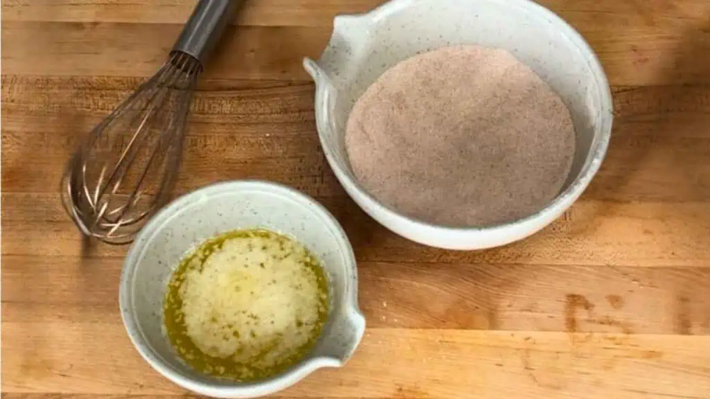 Stir the granulated sugar, cinnamon, and nutmeg together in a shallow bowl for the topping.