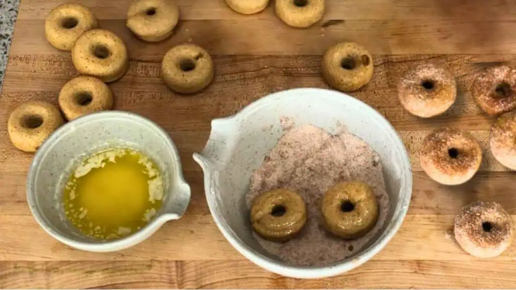 Dip both sides in the melted salted butter, then coat generously in the cinnamon sugar.